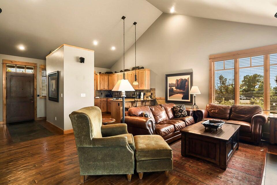 16845 South W Brasada Ranch Road, Unit 23 Powell Butte, OR 97753 - Photo 14 of 47 a living room with furniture and wooden floor