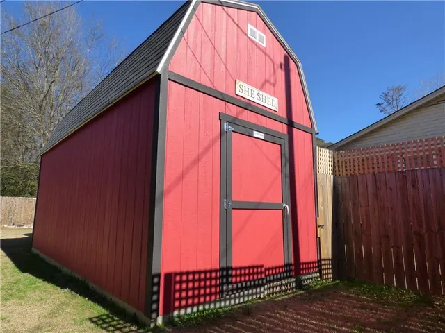 a bathroom with a sink and vanity