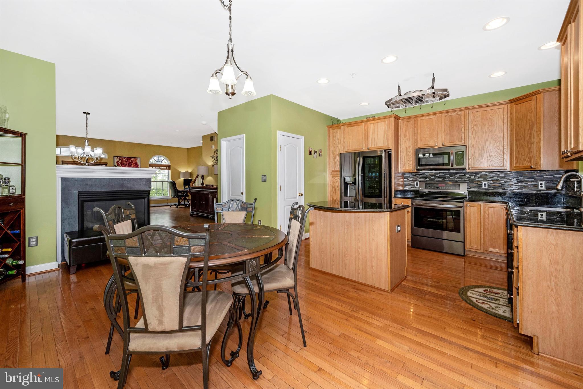 8152 Mississippi Road Laurel, MD 20724 - Photo 21 of 50 Gas fireplace can be enjoyed in multiple rooms