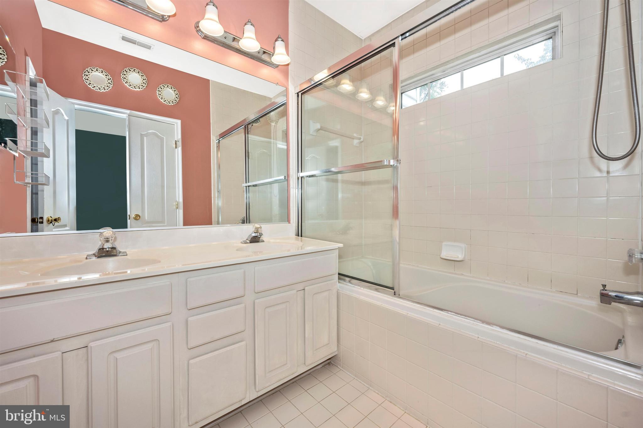 8152 Mississippi Road Laurel, MD 20724 - Photo 24 of 50 Master Bath w/double vanities & tub/shower