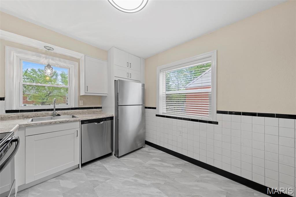 8915 Guthrie Avenue Berkeley, MO 63134 - Photo 11 of 32