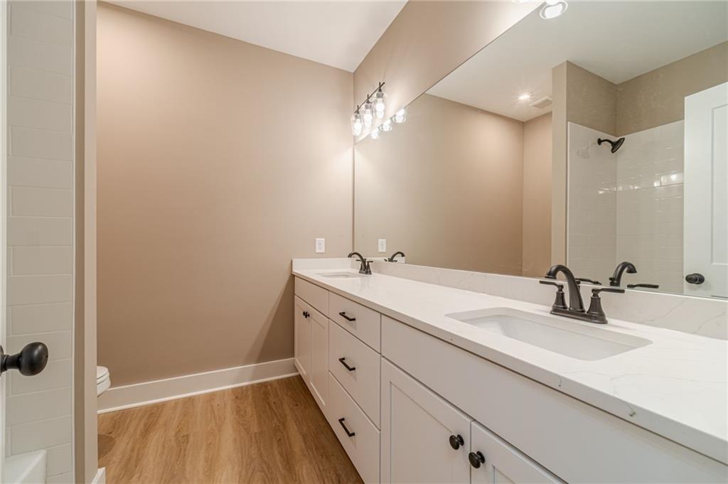 327 Pine Circle Monroe, GA 30655 - Photo 25 of 69 a bathroom with a sink and a mirror