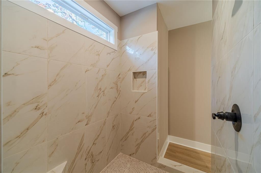 327 Pine Circle Monroe, GA 30655 - Photo 39 of 69 a bathroom with a shower