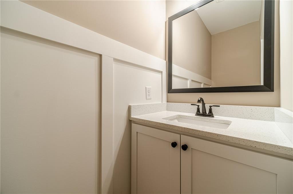 327 Pine Circle Monroe, GA 30655 - Photo 47 of 69 a bathroom with a sink and a mirror