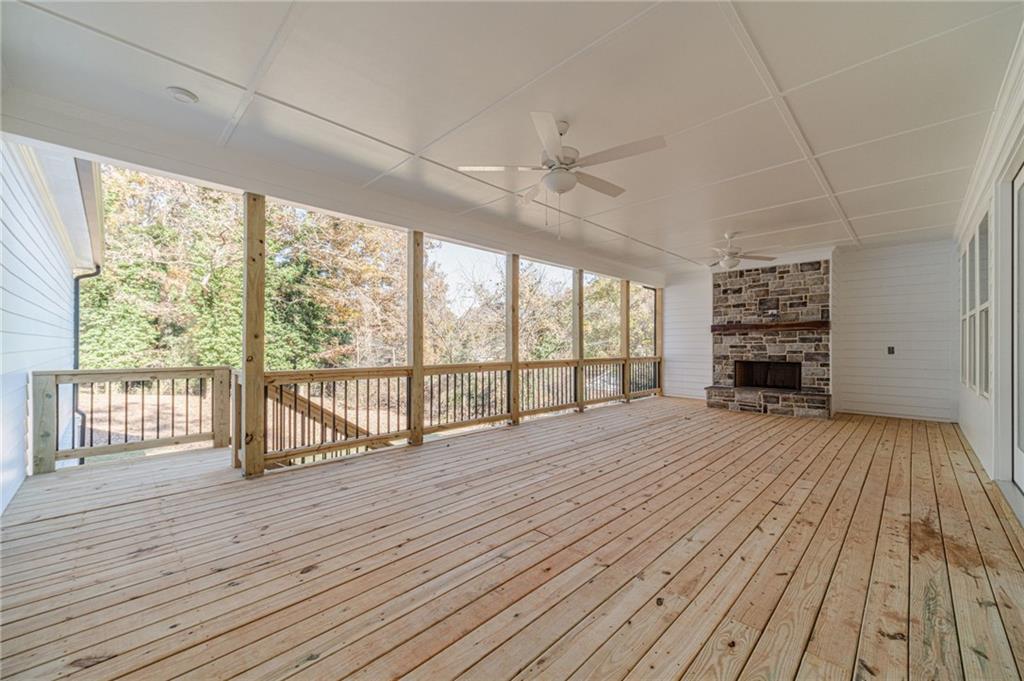 327 Pine Circle Monroe, GA 30655 - Photo 51 of 69 a view of empty room with wooden floor and fan