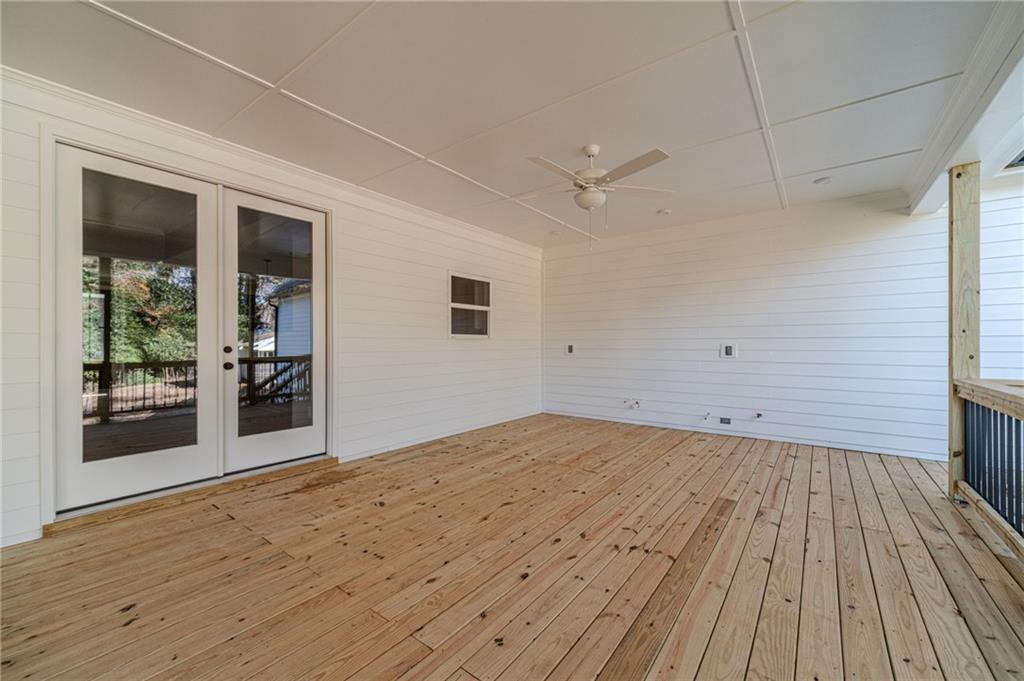 327 Pine Circle Monroe, GA 30655 - Photo 53 of 69 a view of empty room with wooden floor and fan
