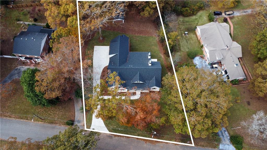 327 Pine Circle Monroe, GA 30655 - Photo 62 of 69 an aerial view of a house with a yard