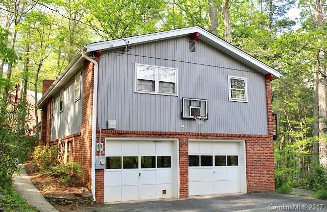 55 Faircrest Road Asheville, NC 28804 - Photo 3 of 20 a view of a house with a yard
