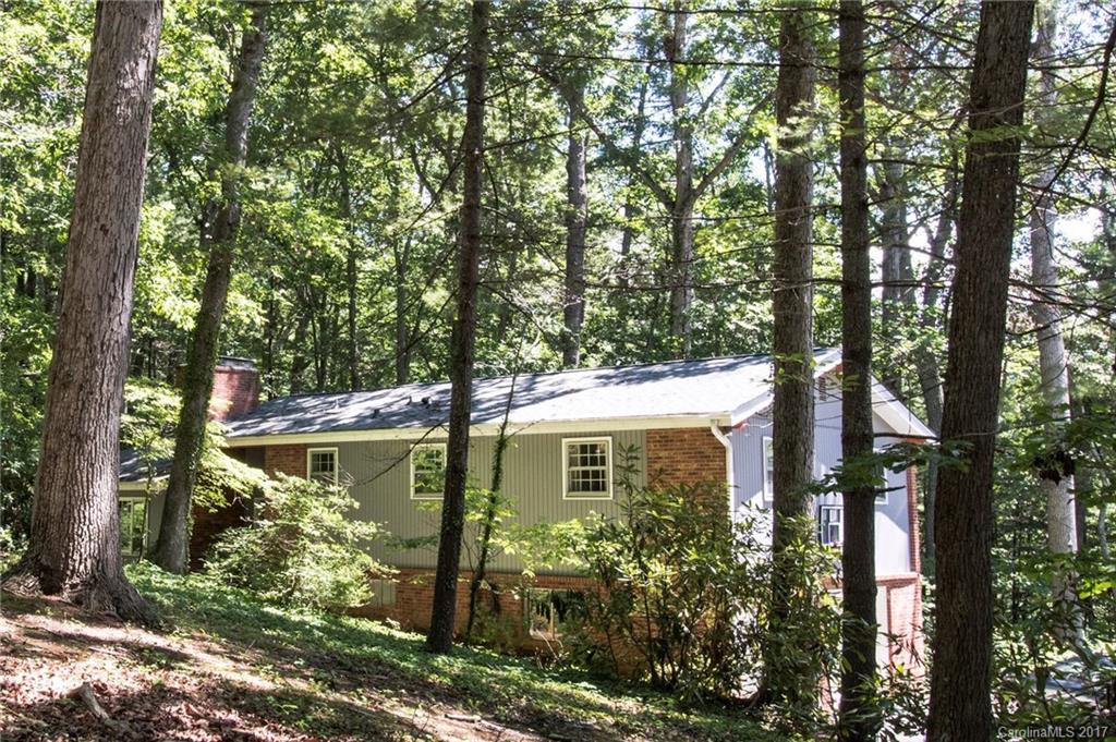 55 Faircrest Road Asheville, NC 28804 - Photo 4 of 20 a view of a house with large trees