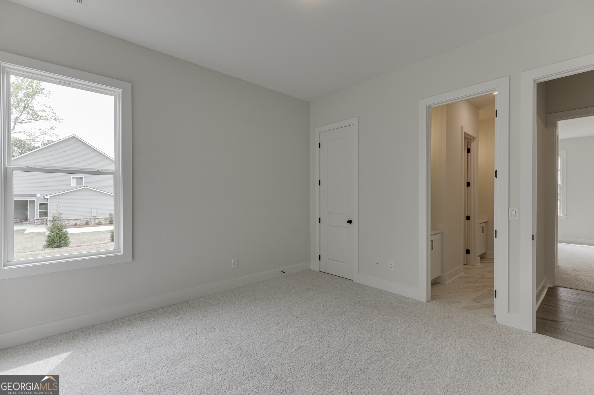 5410 Settingdown Road Cumming, GA 30028 - Photo 24 of 86 a view of an empty room with a window