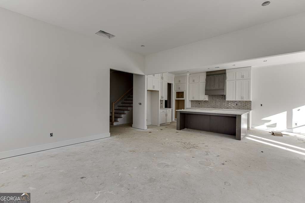 5410 Settingdown Road Cumming, GA 30028 - Photo 31 of 86 a view of a kitchen with a sink and a refrigerator