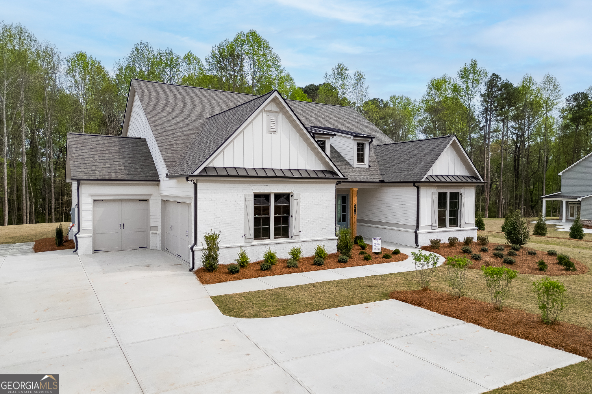 5410 Settingdown Road Cumming, GA 30028 - Photo 4 of 86 a front view of a house with a yard