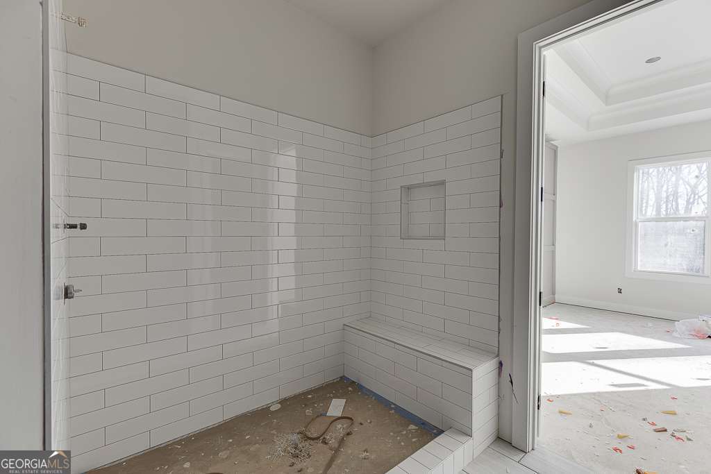5410 Settingdown Road Cumming, GA 30028 - Photo 59 of 86 a bathroom with a shower