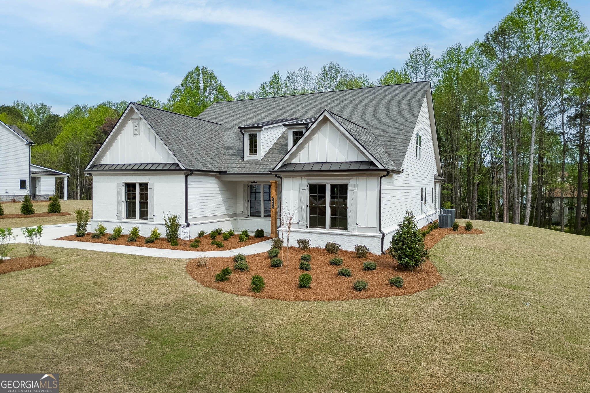 5410 Settingdown Road Cumming, GA 30028 - Photo 6 of 86 a front view of a house with swimming pool