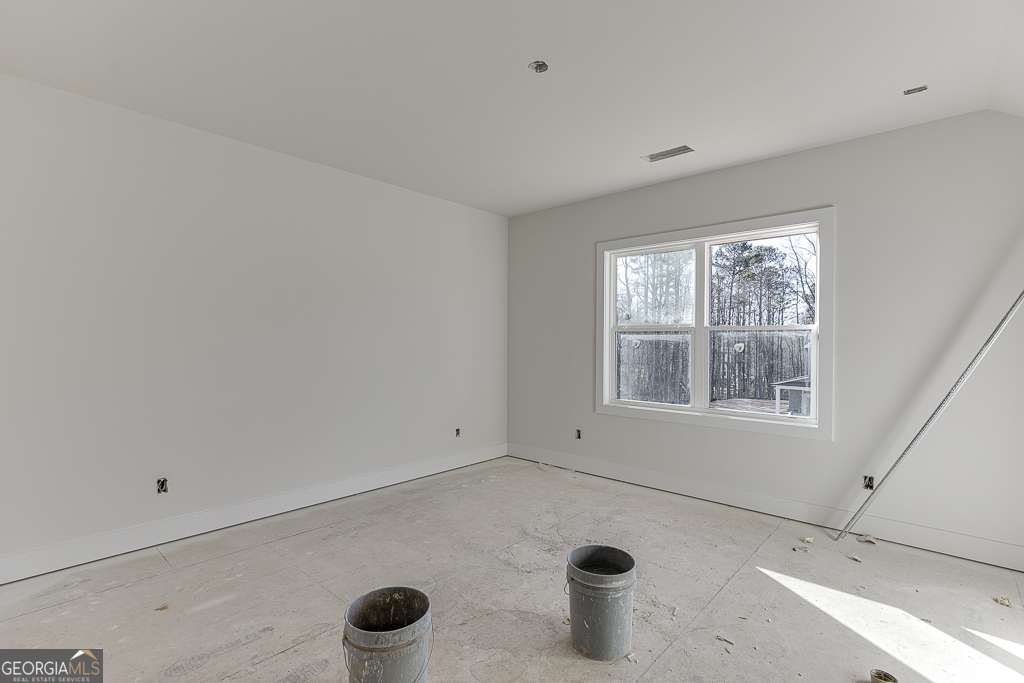 5410 Settingdown Road Cumming, GA 30028 - Photo 69 of 86 a bathroom with a granite countertop sink and a window