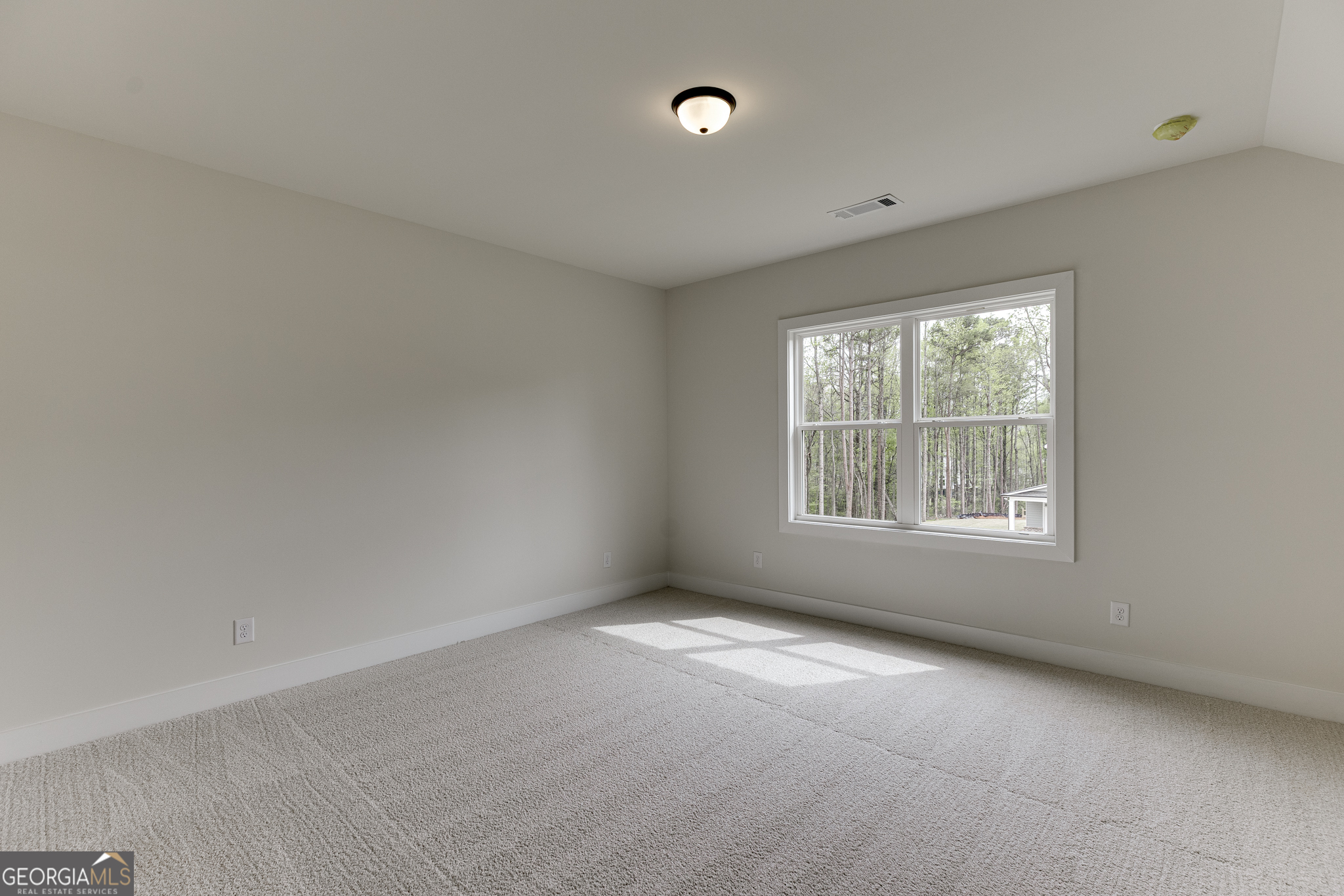 5410 Settingdown Road Cumming, GA 30028 - Photo 78 of 86 an empty room with windows