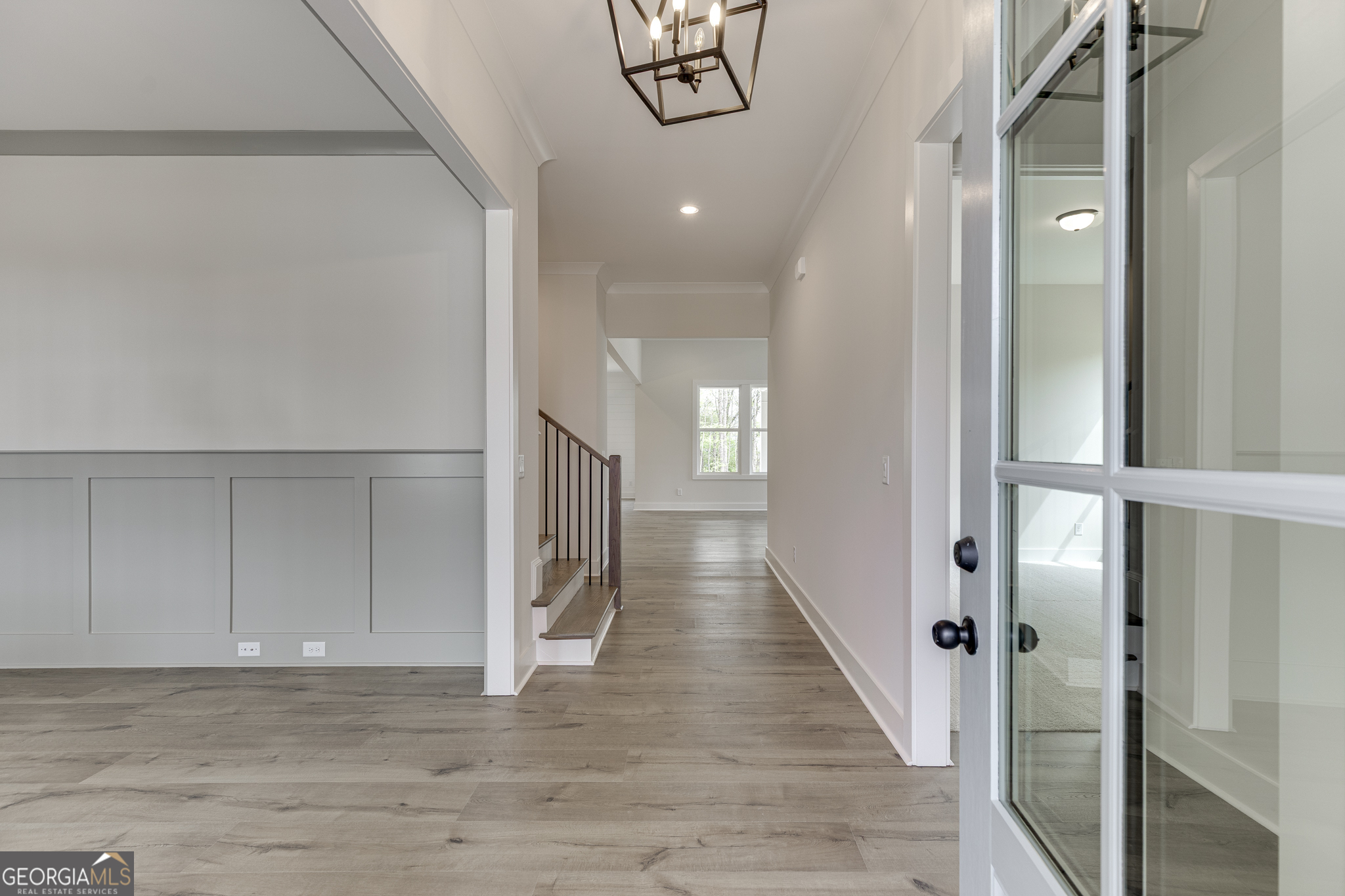 5410 Settingdown Road Cumming, GA 30028 - Photo 8 of 86 a view of a hallway with wooden floor