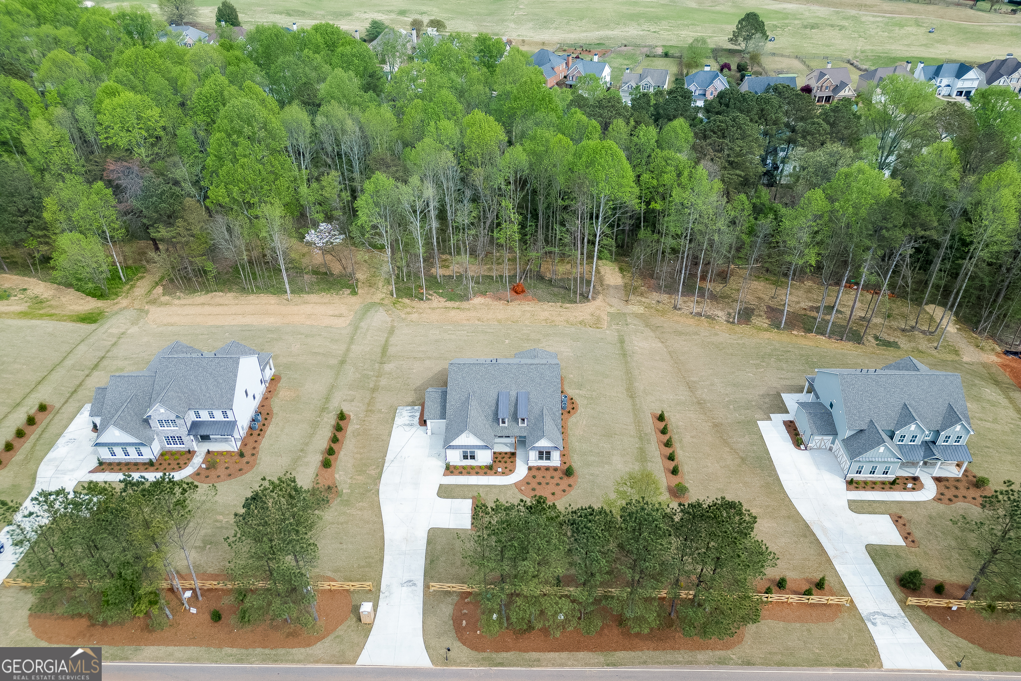 5410 Settingdown Road Cumming, GA 30028 - Photo 84 of 86 an aerial view of a house with a yard basket ball court and outdoor seating