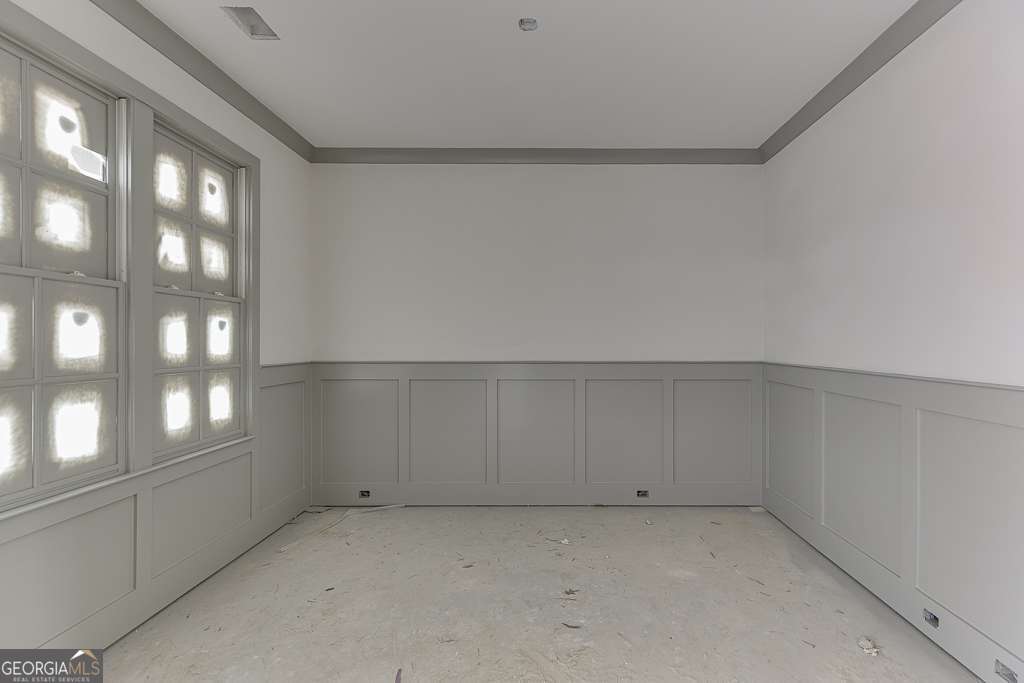 5410 Settingdown Road Cumming, GA 30028 - Photo 9 of 86 a view of an empty room with a window