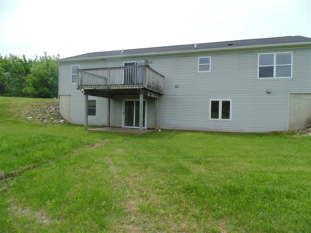 15614 19 Mile Road Tustin, MI 49688 - Photo 5 of 23 overal rear