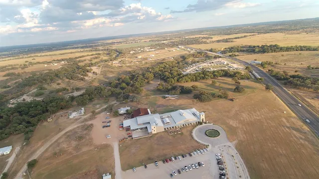 an aerial view of beach and ocean