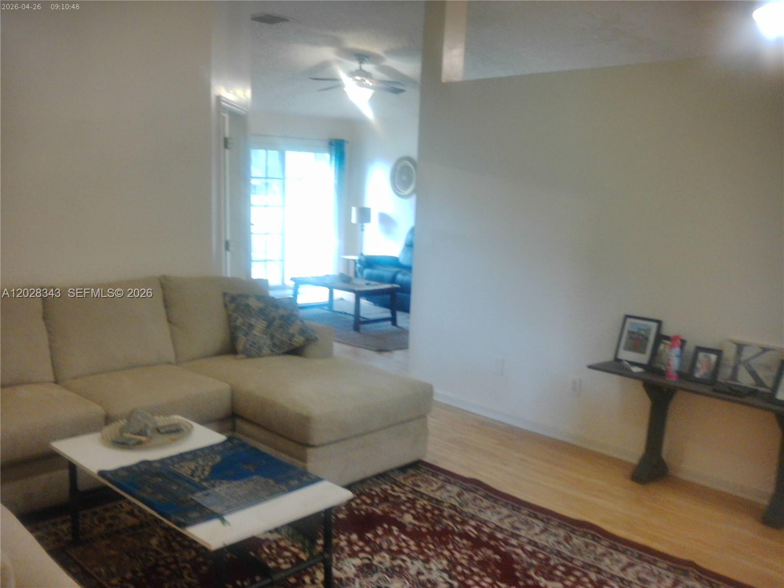 1641 Spring Oaks Lane Jacksonville, FL 32221 - Photo 16 of 44 a living room with furniture and a window
