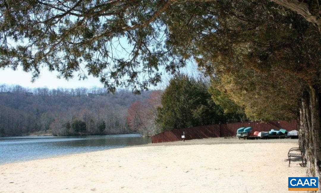 Lot 24 Top Ridge Road Stanardsville, VA 22973 - Photo 15 of 21 a street view covered with tall trees