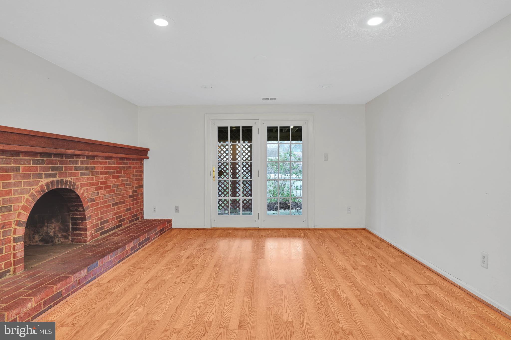 15009 Rocking Spring Drive Rockville, MD 20853 - Photo 40 of 50 Basement Fire Place Living Area