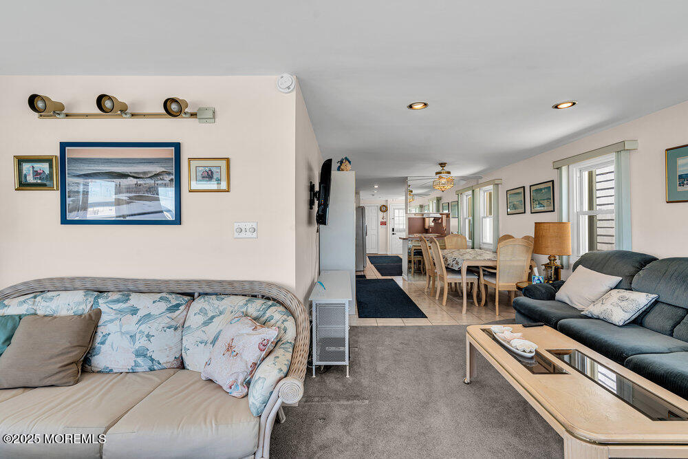 115 Beach Front Manasquan, NJ 08736 - Photo 20 of 32 a living room with furniture and a couch