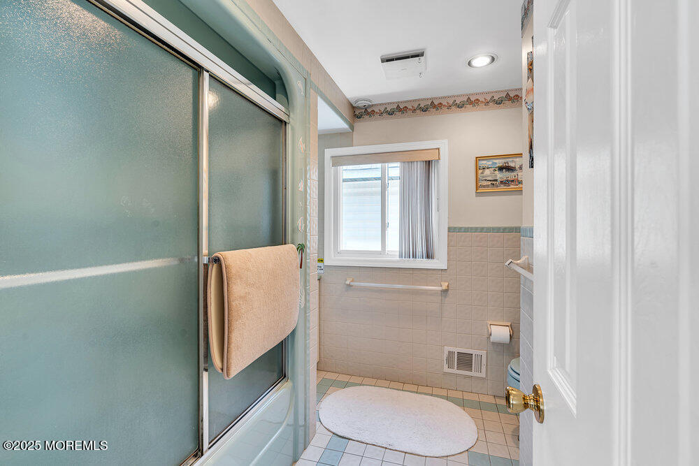115 Beach Front Manasquan, NJ 08736 - Photo 30 of 32 a bathroom with a toilet and a shower