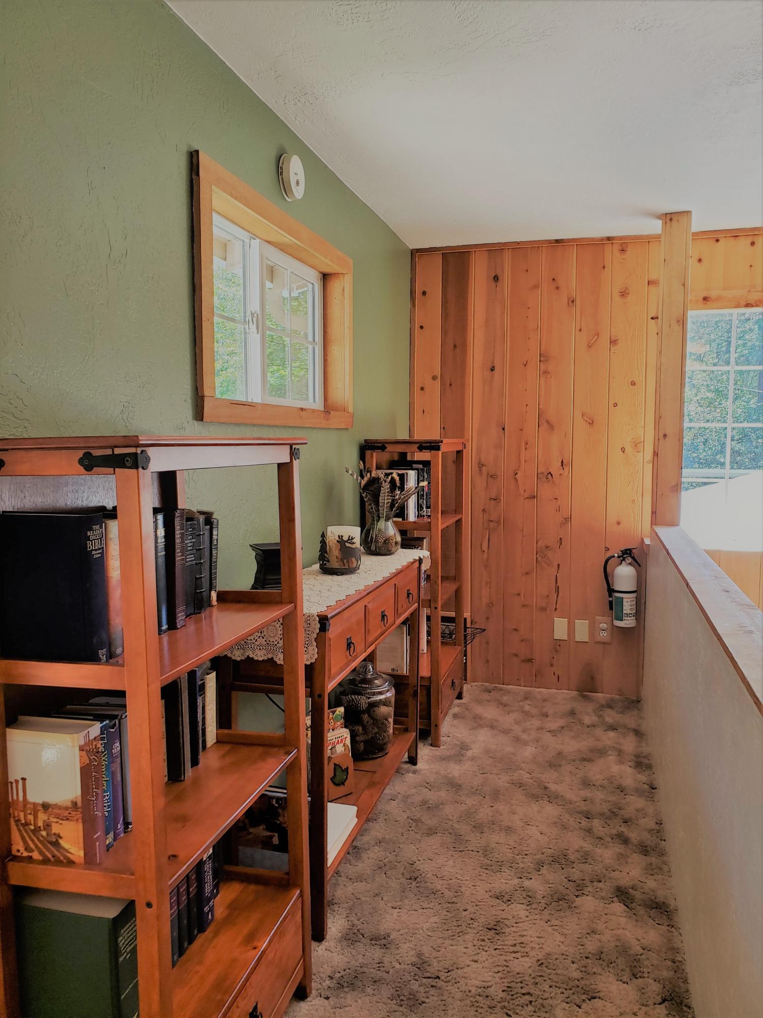 1068 Wards Creek Road Rogue River, OR 97537 - Photo 30 of 57 Other side of the stairway has room for library, furniture, collectibles, you name it!