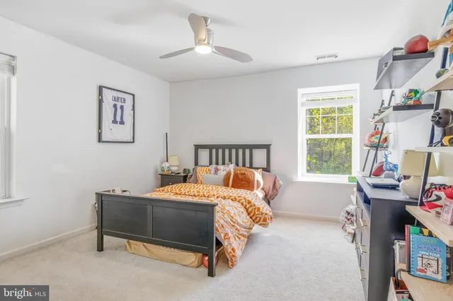 a room with furniture and flat screen tv