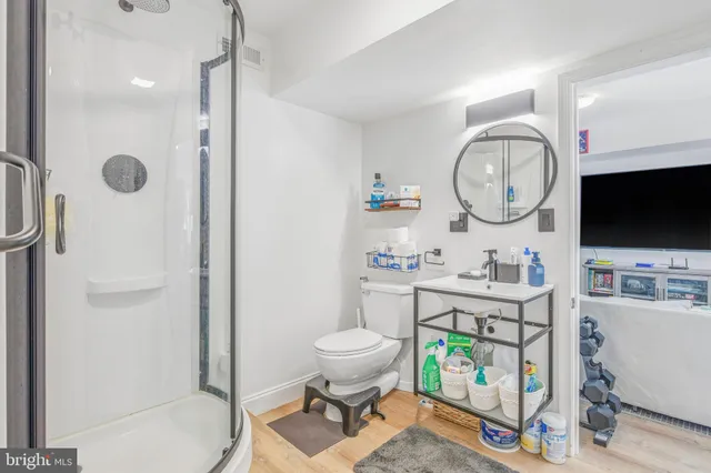 a view of a balcony with wooden fence and floor