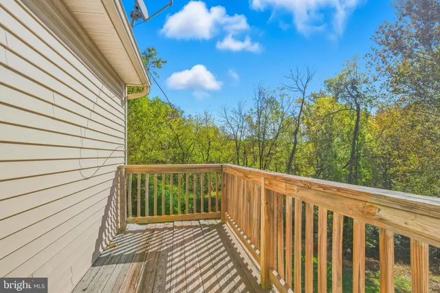 a view of a balcony with door