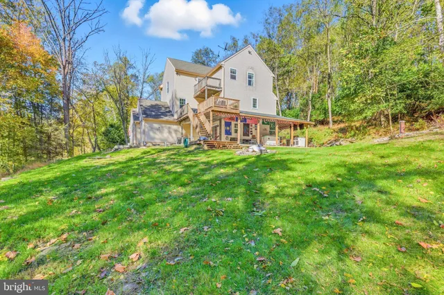 a view of swimming pool with a patio