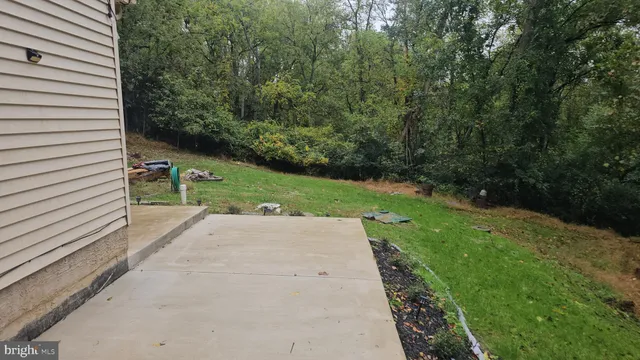 a view of backyard with wooden floor