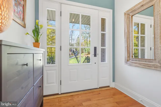 a living room with furniture and window
