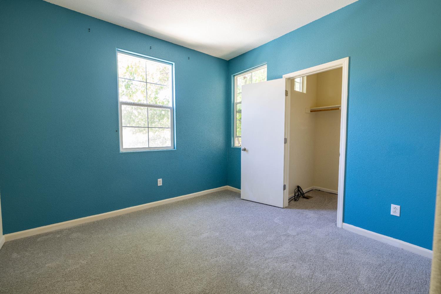3122 Lea Sterling Way Rancho Cordova, CA 95670 - Photo 22 of 31 an empty room with windows and closet