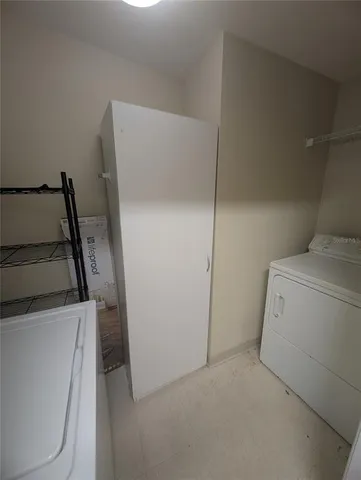 a kitchen with granite countertop a stove top oven and sink