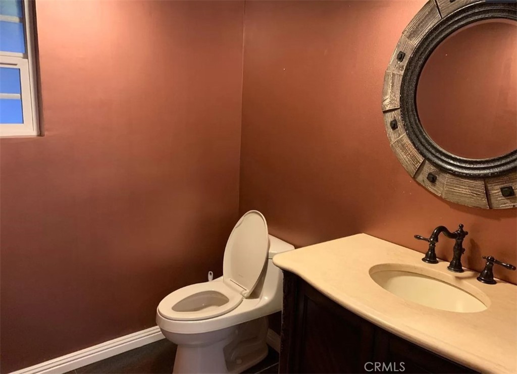 1338 North Jackson Street Glendale, CA 91207 - Photo 12 of 24 a bathroom with a toilet and a sink