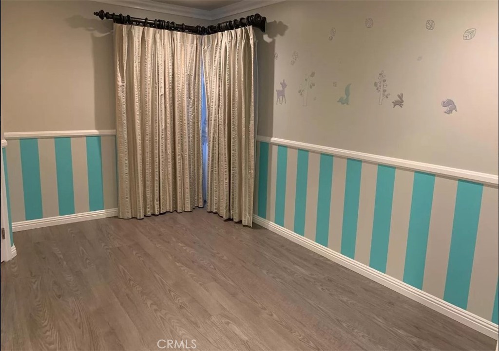 1338 North Jackson Street Glendale, CA 91207 - Photo 6 of 24 a view of a room with a window and a door