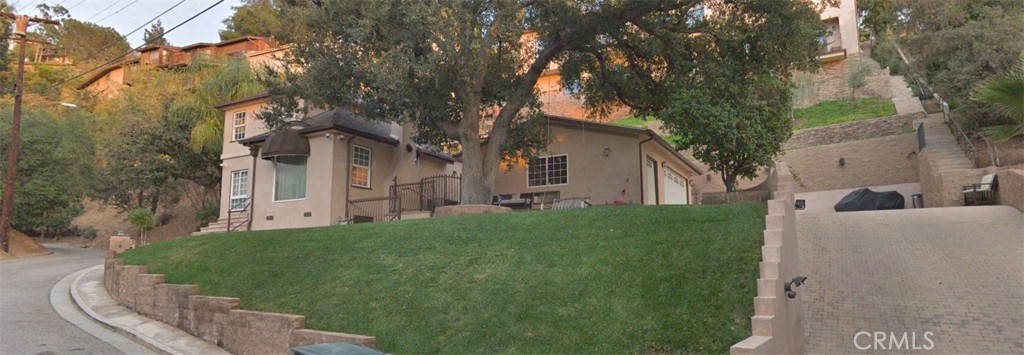 1338 North Jackson Street Glendale, CA 91207 - Photo 9 of 24 a view of a house with a back yard