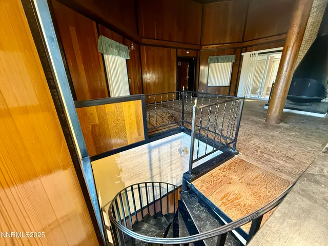 a view of an entryway with a door