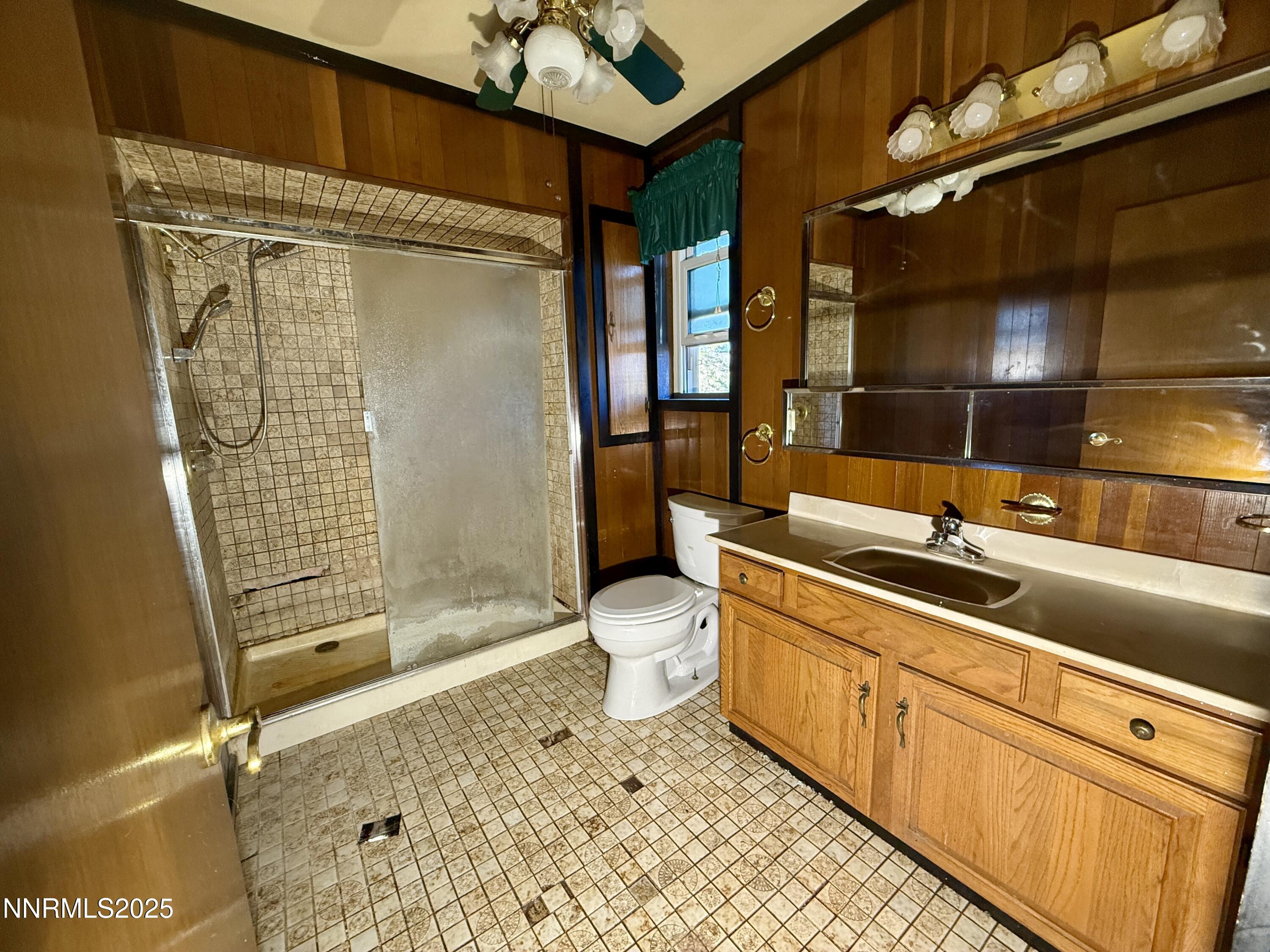 10160 Blackhawk Drive Reno, NV 89508 - Photo 33 of 43 a bathroom with a sink a toilet and shower
