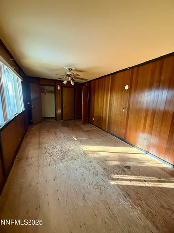 a view of a room with a large window