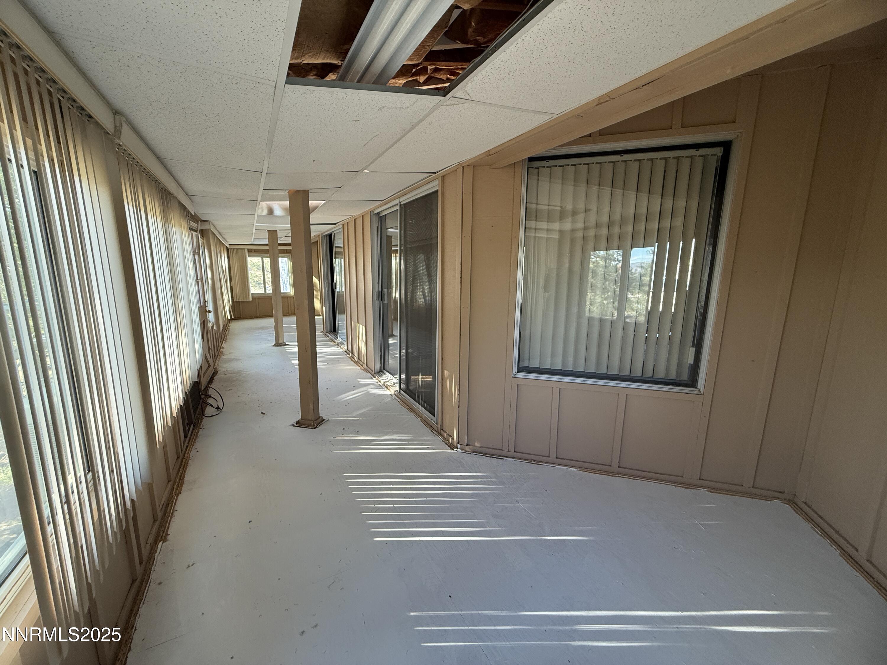 10160 Blackhawk Drive Reno, NV 89508 - Photo 41 of 43 a view of a hallway with entryway and stairs