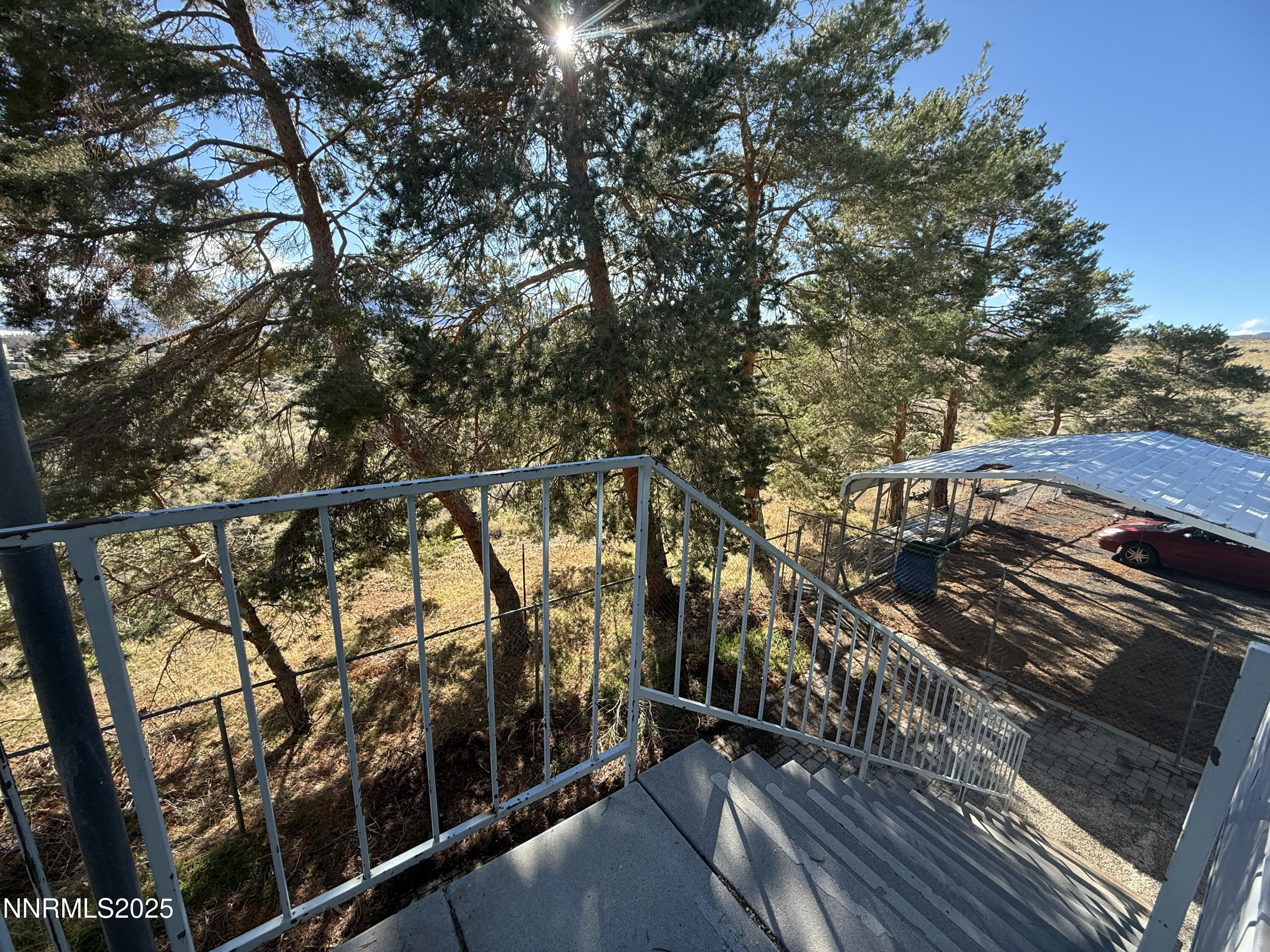 10160 Blackhawk Drive Reno, NV 89508 - Photo 42 of 43 a view of a balcony with trees