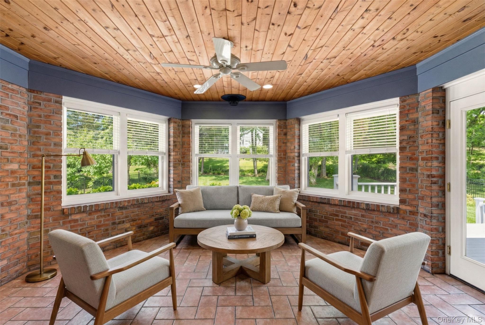9 Mariners Court Centerport, NY 11721 - Photo 15 of 40 a living room with furniture and a large window