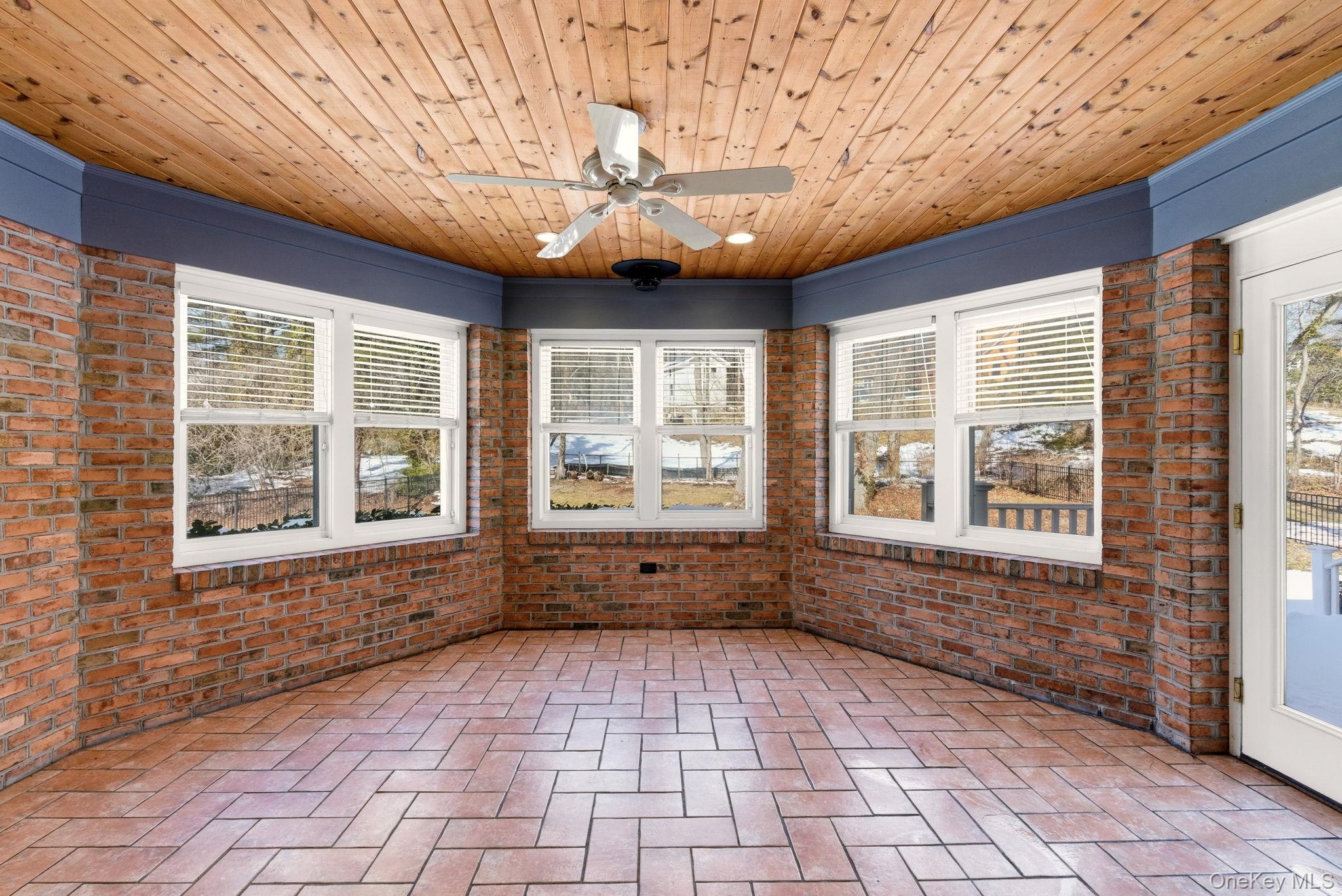 9 Mariners Court Centerport, NY 11721 - Photo 16 of 40 a view of an empty room with a window