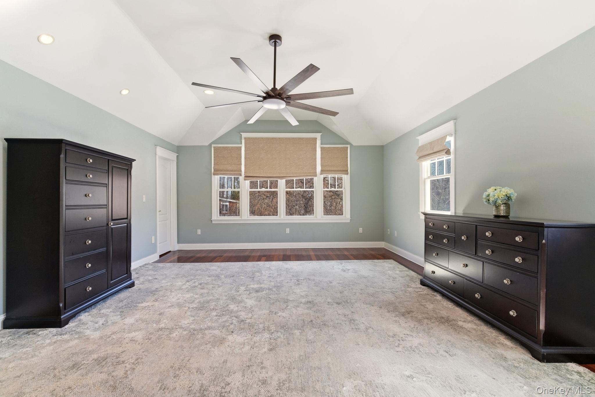 9 Mariners Court Centerport, NY 11721 - Photo 21 of 40 a view of an empty room with a window and cabinet